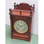 An oak cased Winterhalder & Hofmeier mantel clock, Roman silvered dial 8-day movement,