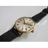 ZENITH: a steel and gold plated gent's wristwatch with silvered dial and baton markers and centre