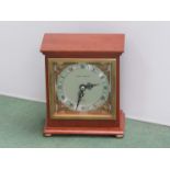 A Mappin and Webb mantel clock, walnut case, brass bun feet, made by Elliot,