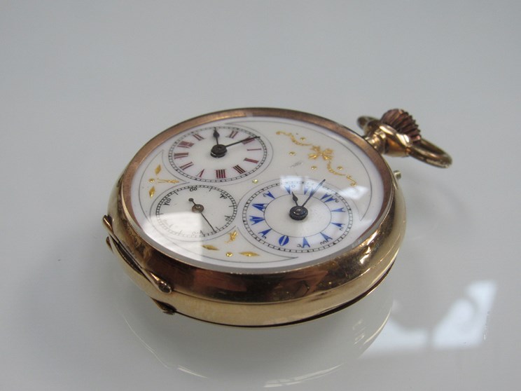 An open faced pocket watch stamped 14K,