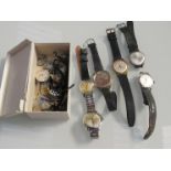 A box of wristwatches and spares