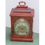 A 20th Century walnut cased Elliott mantel clock retailed by Mappin & Webb,