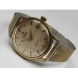 OMEGA: A Geneve automatic gold plated and steel cased gent's wristwatch,