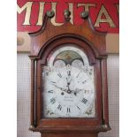 A Georgian oak longcase clock with painted arched dial and Roman chapter ring,