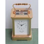 A 20th Century brass cased Morrell and Hilton English carriage clock, Roman dial, with key, 13.