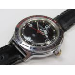 BOCTOK: a steel casd mid 20th Century Russian diver's wristwatch with black dial,