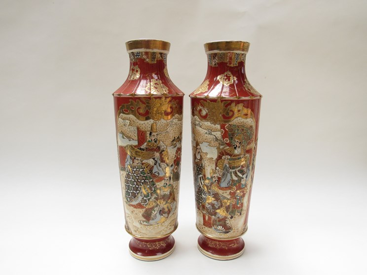 A pair of circa 1900 satsuma vases with figural cartouches,