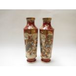 A pair of circa 1900 satsuma vases with figural cartouches,