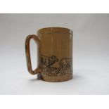 A Doulton Lambeth Florence Barlow tankard depicting sheep, monogrammed F.E.B. to base. 11.