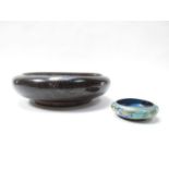 A cloisonne black bowl with drag on head pattern,