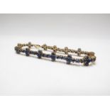 A 9ct gold cabochon sapphire bracelet