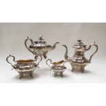 A Georgian silver plated melon design four piece tea set with scrolled and acathus feet