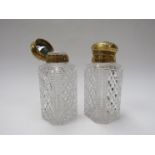 A pair of 19th Century large cut glass dressing table jars,