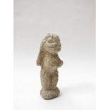 An early West African carved stone maternity figure,
