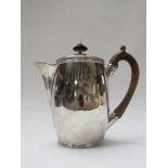 A George III silver hot water/coffee pot with treen finial and handle, London 1791 with banded rim ,