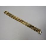 A mid to late 20th Century 18ct gold articulated bracelet (40g approximately)