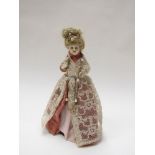 An Amaryllis scent bottle with porcelain doll form cover,