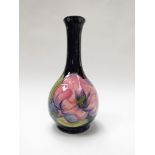 A Moorcroft magnolia baluster form vase,