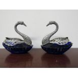 A pair of swan salts marked 800,