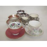 Five China cups and saucers including Aynsley and Mintons and a matching jug