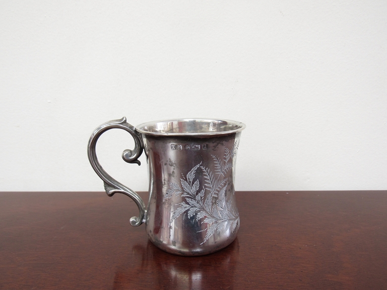 A Kemp Brothers silver Christening mug, engraved fern detail, monogrammed P.M..W.