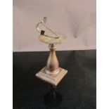 A bronze Edwardian armillary miniature sundail