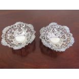 A pair of William Comyns and Sons silver pierced bon-bon dishes, wavy form rim, marked London 1892,