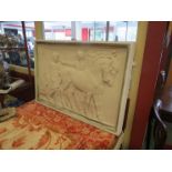 An early 20th Century classical plaster wall plaque