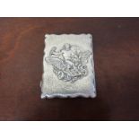 A silver embossed card case/aide memoire depicting Triptolemus on a winged chariot with serpents,