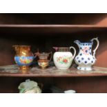 Four Victorian copper lustre jugs