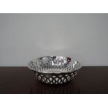 A silver bon-bon dish, lattice form, Birmingham marks rubbed,