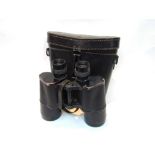 A WWI German pair of 7x50 Dienstglas army binoculars in their correct 1939 dated black leather case