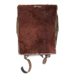 A WWII German fur backpack with leather straps and owner's name