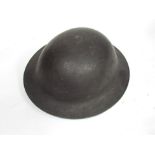 Two WWII British helmets in black,