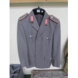 A mid 20th Century German military jacket, pocket label C LOUIS WEBER Mit Frontfixierung,