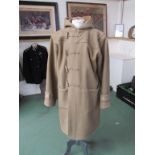 A WWII Duffel coat dated 1944, size 2,