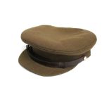 A mid 20th Century British Army officer's peaked cap together with later example, with box.