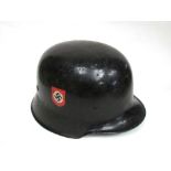 A German WWII double decal Police helmet with liner and chin strap