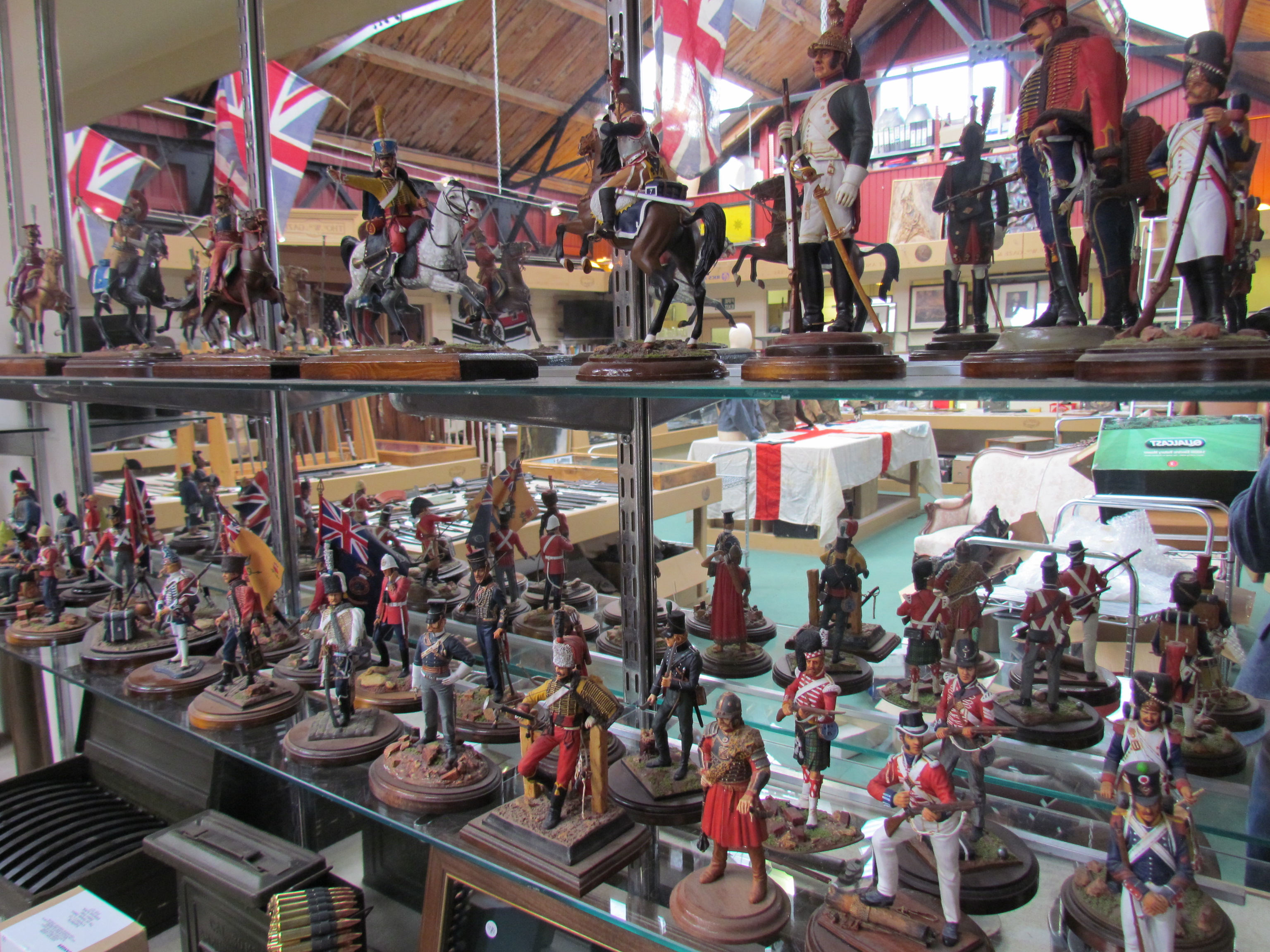 A collection of hand-painted metal and resin figurines, mainly Napoleonic,