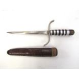 A hand-crafted alloy and brass dagger,