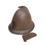 A vintage pot helmet in the style of a 17th Century caspanet with ear guards, one unattached.