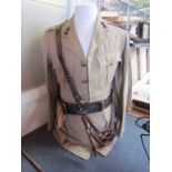 A WWII British Army jacket and trousers dated 1939, by Johnstone,