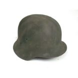 A WWII German M42 helmet in the Normandy pattern