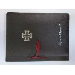 A WWII German memorial casualty book / photograph album with approximately 51 photos