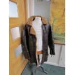 A WWII era 'Irvin' sheepskin flying jacket with contemporary lower-section extension to a coat a/f