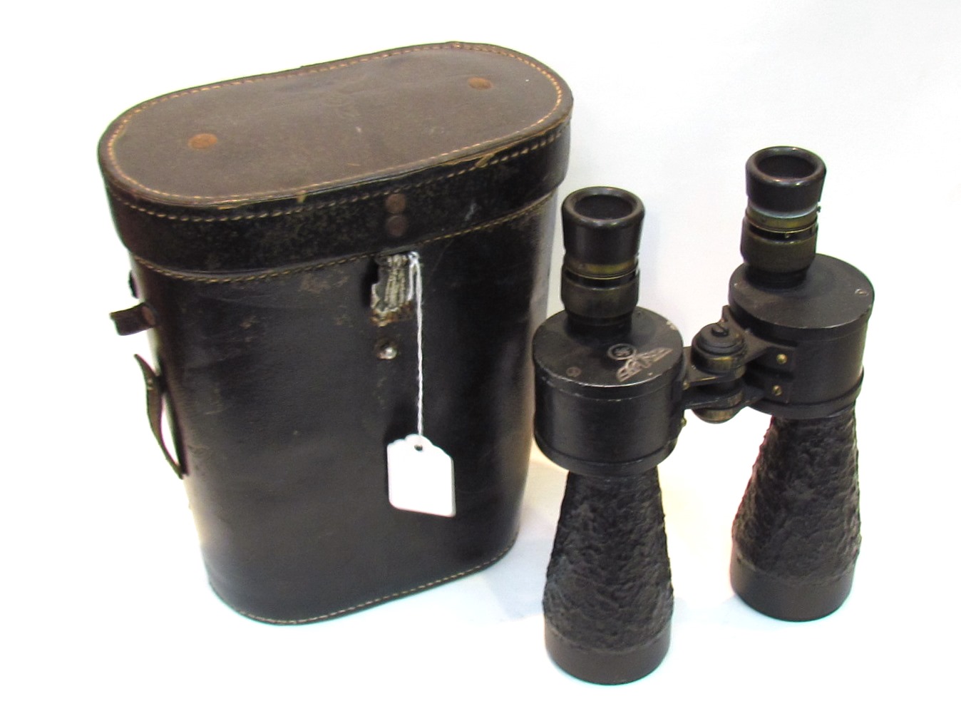 A WWII German pair of Kriegsmarine binoculars engraved with eagle,