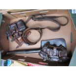 A box containing German equipment including belt,