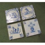 Four 17th/18th Century blue and white Delft tiles including buffalo and bullrushes in vase