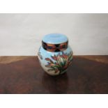 A Walter Moorcroft ginger jar with floral pattern, base marked,