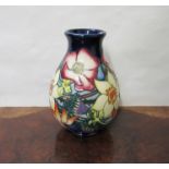 A Moorcroft Pottery 'Gold Jubilee' pattern vase, 2002, of Ovoid form 19½ cm tall,